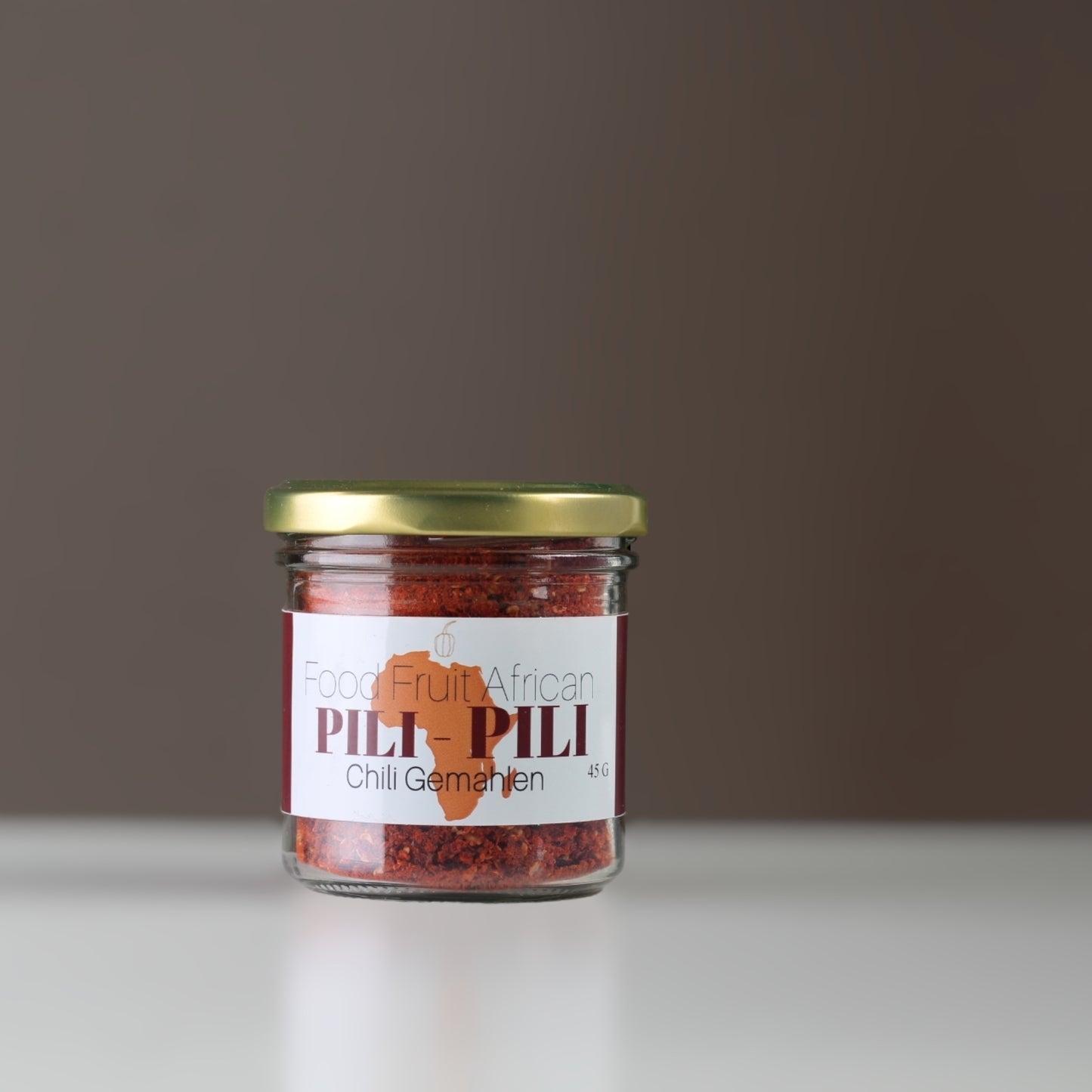 Pili-Pili Chili gemahlen. Wundervoll aromatisch. Verfeinert jedes scharfes Gericht.